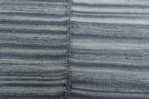 Backside of handmade New Kilim Kiasar rug showing knot structure and weave density