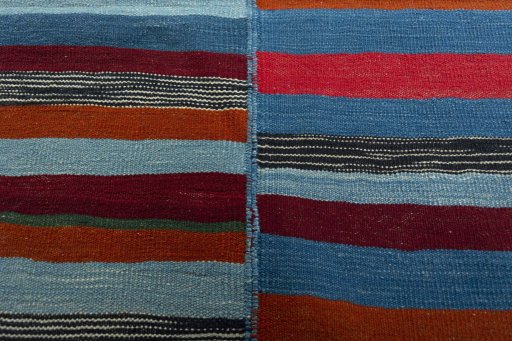 Backside of handmade New Kilim Kiasar rug showing knot structure and weave density