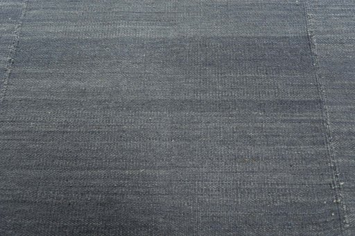 Backside of handmade New Kilim Kiasar rug showing knot structure and weave density