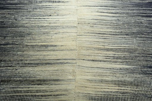 Backside of handmade New Kilim Kiasar rug showing knot structure and weave density