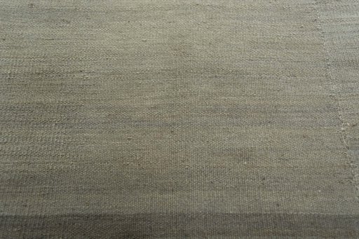 Backside of handmade New Kilim Kiasar rug showing knot structure and weave density
