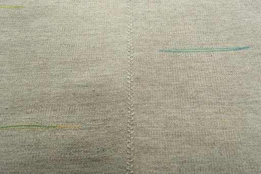 Backside of handmade New Kilim Kiasar rug showing knot structure and weave density
