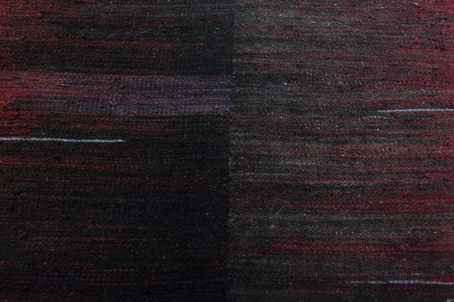 Backside of handmade New Kilim Kiasar rug showing knot structure and weave density
