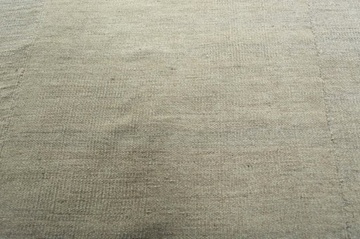 Backside of handmade New Kilim Kiasar rug showing knot structure and weave density