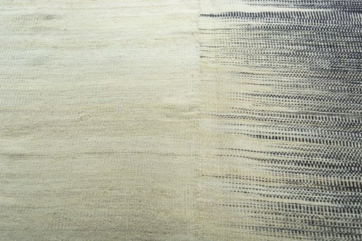 Backside of handmade New Kilim Kiasar rug showing knot structure and weave density