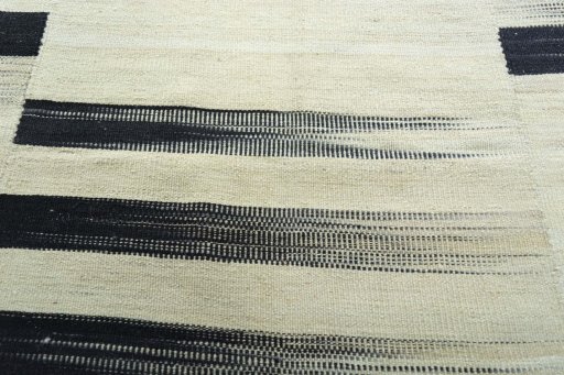 Backside of handmade New Kilim Kiasar rug showing knot structure and weave density