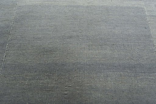 Backside of handmade New Kilim Kiasar rug showing knot structure and weave density