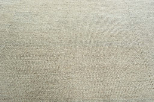 Backside of handmade New Kilim Kiasar rug showing knot structure and weave density