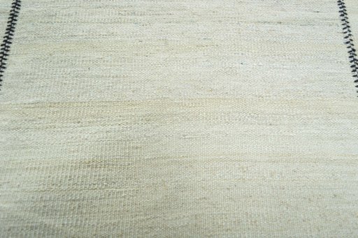 Backside of handmade New Kilim Kiasar rug showing knot structure and weave density