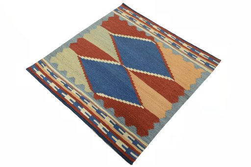 Corner detail of New Kilim Sofre rug showing border pattern and Wool pile