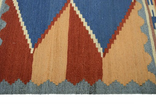 Close-up detail of New Kilim Sofre rug from Iran / Persia showing Wool weave
