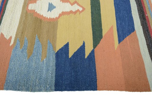 Close-up detail of New Kilim Sofre rug from Iran / Persia showing Wool weave