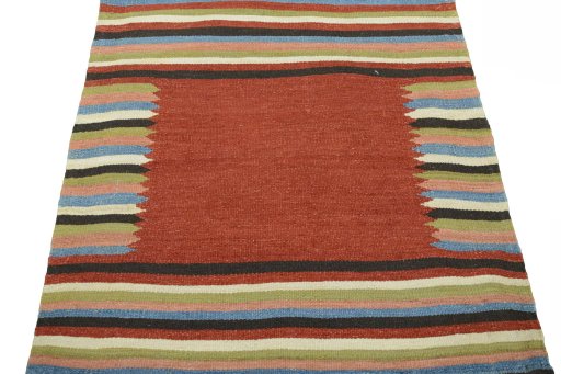 Close-up detail of New Kilim Sofre rug from Iran / Persia showing Wool weave