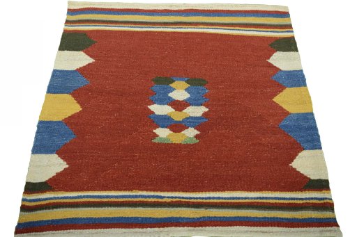 Close-up detail of New Kilim Sofre rug from Iran / Persia showing Wool weave