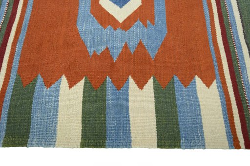 Close-up detail of New Kilim Sofre rug from Iran / Persia showing Wool weave