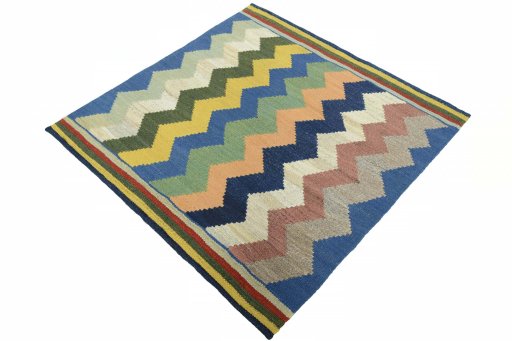 Corner detail of New Kilim Sofre rug showing border pattern and Wool pile
