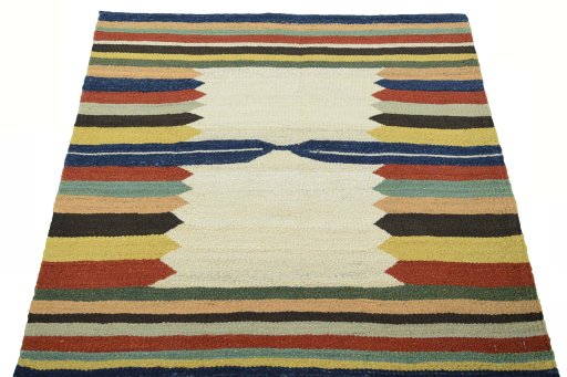 Close-up detail of New Kilim Sofre rug from Iran / Persia showing Wool weave