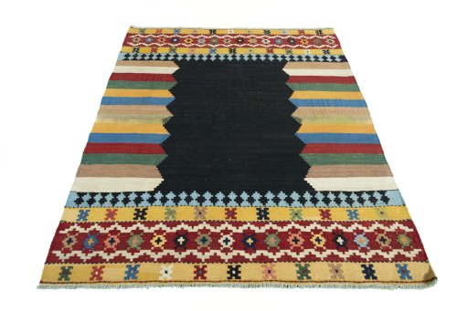 Close-up detail of New Kilim Sofre rug from Iran / Persia showing Wool weave