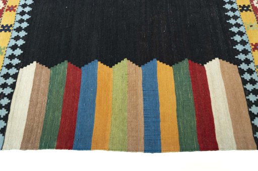 Close-up detail of New Kilim Sofre rug from Iran / Persia showing Wool weave