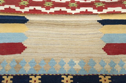 Full view of New Kilim Sofre rug from Iran / Persia, 186 × 124 cm in Multi Color tones