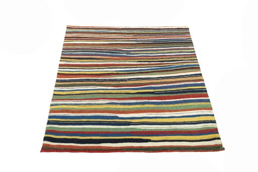 Close-up detail of New Kilim Sofre rug from Iran / Persia showing Wool weave