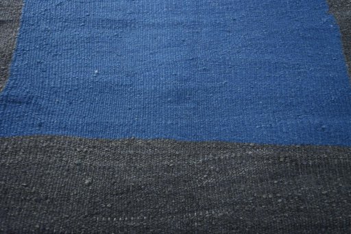 Backside of handmade New Kilim Sofre rug showing knot structure and weave density