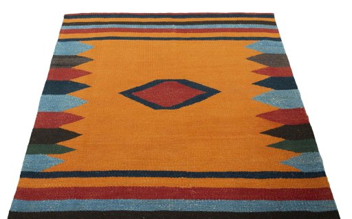 Close-up detail of New Kilim Sofre rug from Iran / Persia showing Wool weave