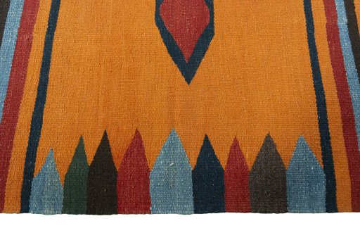 Close-up detail of New Kilim Sofre rug from Iran / Persia showing Wool weave