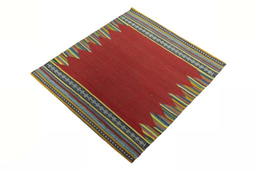 Corner detail of New Kilim Sofre rug showing border pattern and Wool pile