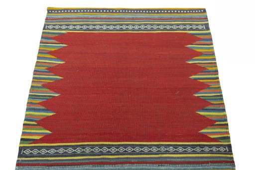 Close-up detail of New Kilim Sofre rug from Iran / Persia showing Wool weave