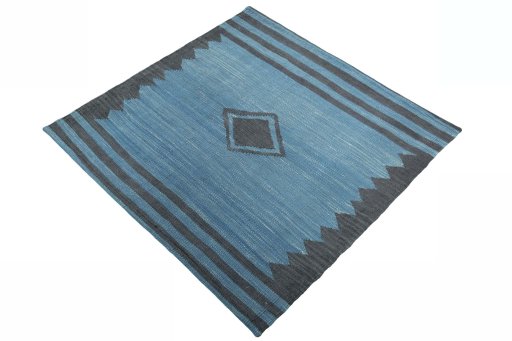 Corner detail of New Kilim Sofre rug showing border pattern and Wool pile