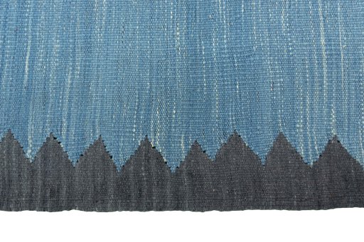 Close-up detail of New Kilim Sofre rug from Iran / Persia showing Wool weave