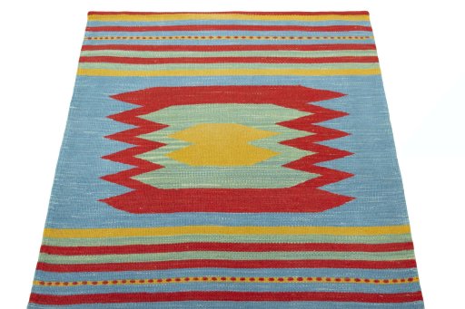 Close-up detail of New Kilim Sofre rug from Iran / Persia showing Wool weave