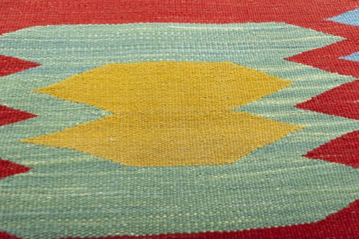 Backside of handmade New Kilim Sofre rug showing knot structure and weave density