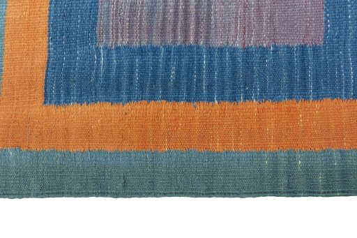 Close-up detail of New Kilim Sofre rug from Iran / Persia showing Wool weave