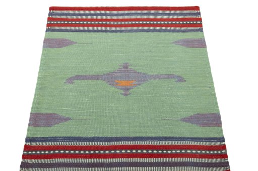 Close-up detail of New Kilim Sofre rug from Iran / Persia showing Wool weave
