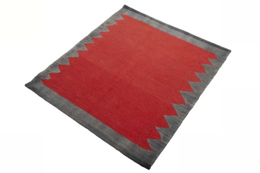 Corner detail of New Kilim Sofre rug showing border pattern and Wool pile