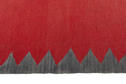 Close-up detail of New Kilim Sofre rug from Iran / Persia showing Wool weave