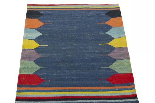 Close-up detail of New Kilim Sofre rug from Iran / Persia showing Wool weave