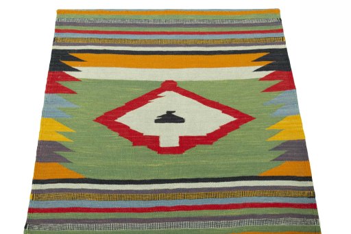 Close-up detail of New Kilim Sofre rug from Iran / Persia showing Wool weave