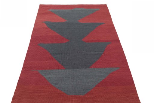 Close-up detail of New Kilim Sofre rug from Iran / Persia showing Wool weave