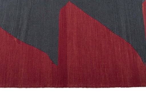 Close-up detail of New Kilim Sofre rug from Iran / Persia showing Wool weave