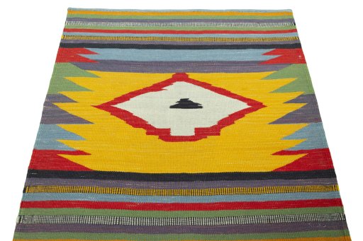 Close-up detail of New Kilim Sofre rug from Iran / Persia showing Wool weave