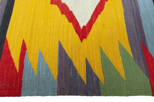 Close-up detail of New Kilim Sofre rug from Iran / Persia showing Wool weave