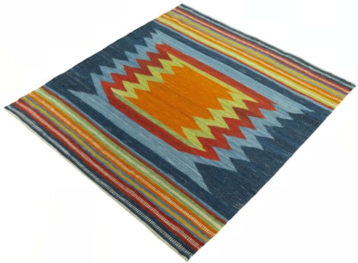 Corner detail of New Kilim Sofre rug showing border pattern and Wool pile