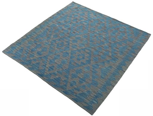Corner detail of New Kilim Sofre rug showing border pattern and Wool pile