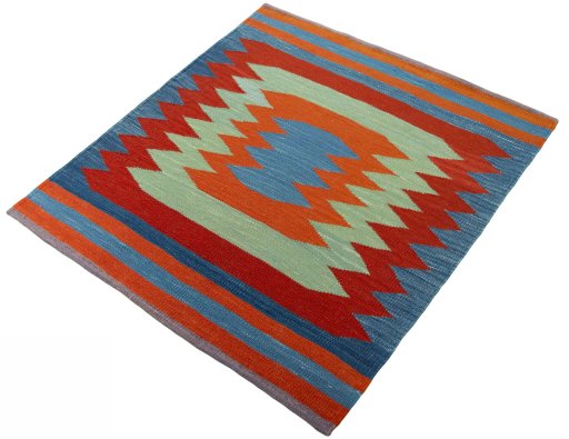 Corner detail of New Kilim Sofre rug showing border pattern and Wool pile