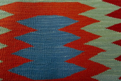 Backside of handmade New Kilim Sofre rug showing knot structure and weave density