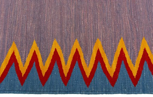 Close-up detail of New Kilim Sofre rug from Turkey showing Wool weave