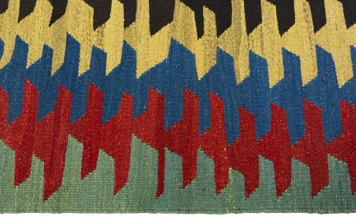Close-up detail of New Kilim Sofre rug from Turkey showing Wool weave